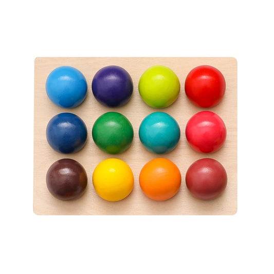 Juego Montessori pelotas de madera de colores